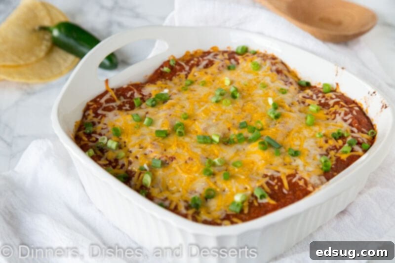 Sky-High Chicken Enchiladas 3 Stacked Chicken Enchiladas - all the flavors of chicken enchiladas in an easy layered casserole. Much less work, same great taste, so dinner is on the table fast!