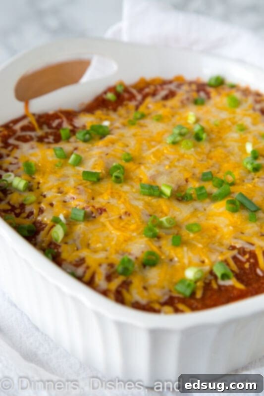 Sky-High Chicken Enchiladas 4 Stacked Chicken Enchiladas - all the flavors of chicken enchiladas in an easy layered casserole. Much less work, same great taste, so dinner is on the table fast!
