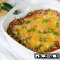 Sky-High Chicken Enchiladas 5 stacked chicken enchiladas in a pan
