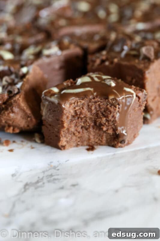 Foolproof Microwave Fudge 2 easy microwave fudge on a plate, cut into perfect squares