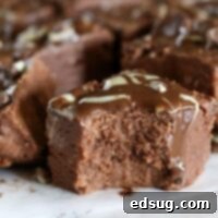 Easy Microwave Fudge - creamy fudge is always a hit around the holidays. Make it in the microwave in 15 minutes with this fool-proof, stress free recipe.