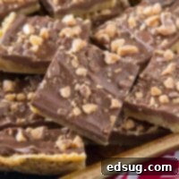 Chocolate Toffee Bars - crispy toffee flavored bars topped with chocolate and lots of bits of toffee. Just 6 ingredients, and so easy to make!