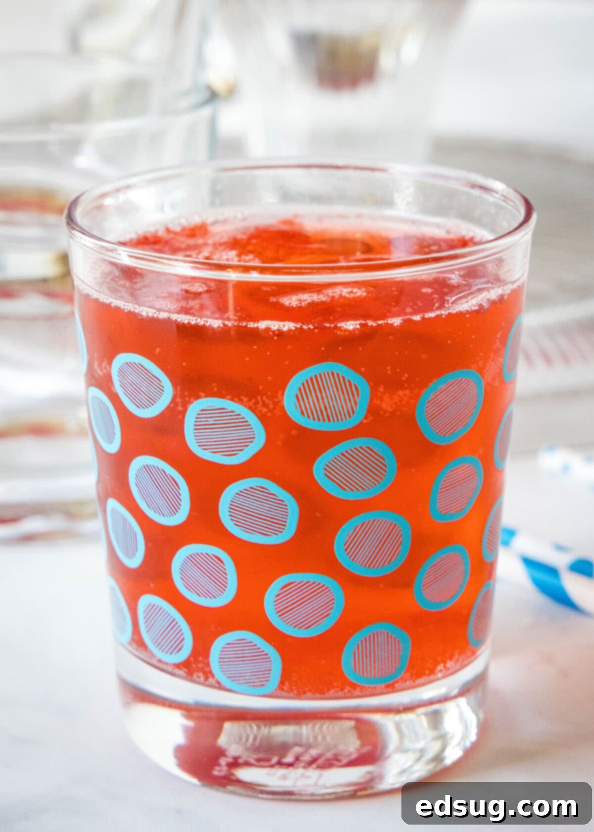 Festive Punch 2 Holiday punch in a glass with a blue circle pattern.