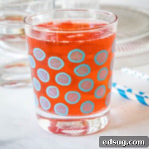 Festive Punch 9 Holiday punch in a glass with a blue circle pattern.