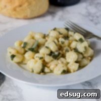 Pillowy Parmesan Gnocchi with Brown Butter Sage Sauce 6 Parmesan Gnocchi with Sage Butter- comfort food that is on the table in 15 minutes. Soft gnocchi tossed with melted butter, sage, and Parmesan cheese!