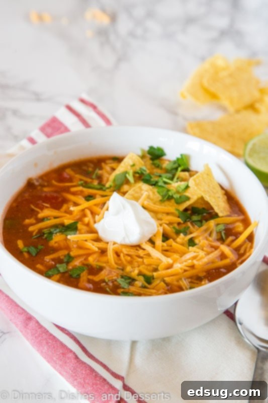 Close-up of taco soup in a bowl with corn and beans visible
