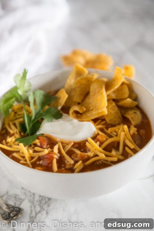Full bowl of taco soup with a spoon, ready to eat