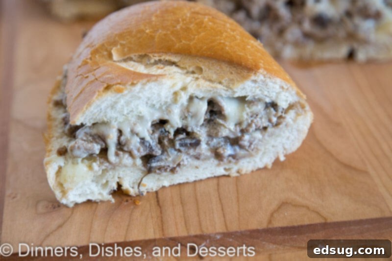 Hearty Beef Stroganoff Bread 3 Close-up of Beef Stroganoff Stuffed bread on a board