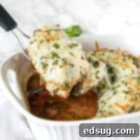 Rustic Italian Chicken Bake 6 A pan of chicken with cheese