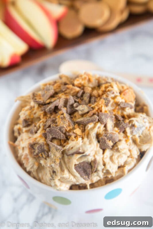 Close-up of creamy peanut butter Butterfinger dip in a serving bowl
