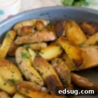 Pan Seared Mojo Potatoes - fingerling potatoes are seared and cooked to perfection in just minutes. Then mixed with a cilantro and herb mixture for a delicious side dish.