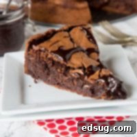 Slice of Gooey Brownie pie on a plate