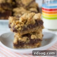 Oat bars stacked on a plate
