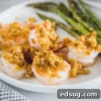 27 Effortless Shrimp Meals 6 Close up of perfectly crispy baked shrimp, golden brown and delicious.