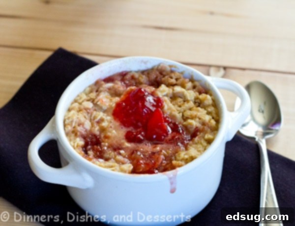 Nostalgic PB&J Oatmeal Bake 3 single serve baked oatmeal in a white bowl