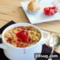 close up peanut butter and jelly baked oatmeal in a white bowl