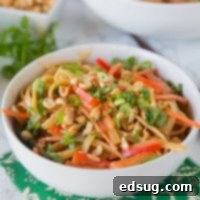 Thai Peanut Noodles - Super easy Asian noodles mixed with a creamy peanut butter sauce with bell peppers and carrots.
