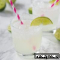 The Quintessential Lime Margarita, On the Rocks 7 A refreshing classic lime margarita in a glass, ready to be enjoyed.