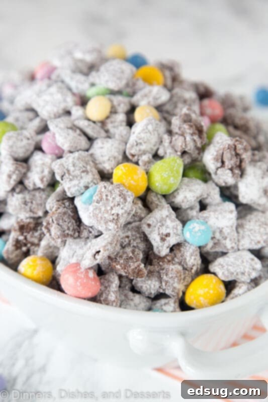 Easter Bunny Chow 2 Close up of Easter Muddy Buddies with colorful M&M's and chocolate eggs