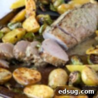 One-Pan Pork Tenderloin Dinner 7 Sheet Pan Pork Tenderloin - tender and juicy pork tenderloin with Brussels sprouts, roasted potatoes and topped with a Dijon herb vinaigrette. Ready quickly, super easy, and so good!