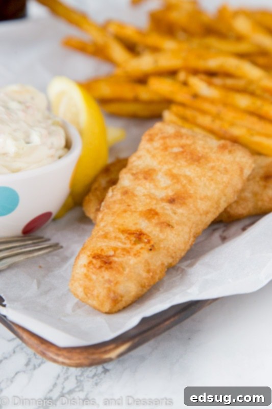 The Secret to Red Lobster's Iconic Tartar Sauce 2 A plate of food, with Tartar sauce and Fish and chips