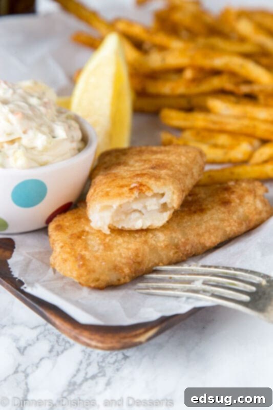 The Secret to Red Lobster's Iconic Tartar Sauce 4 A plate of food, with Tartar sauce and Fish and chips