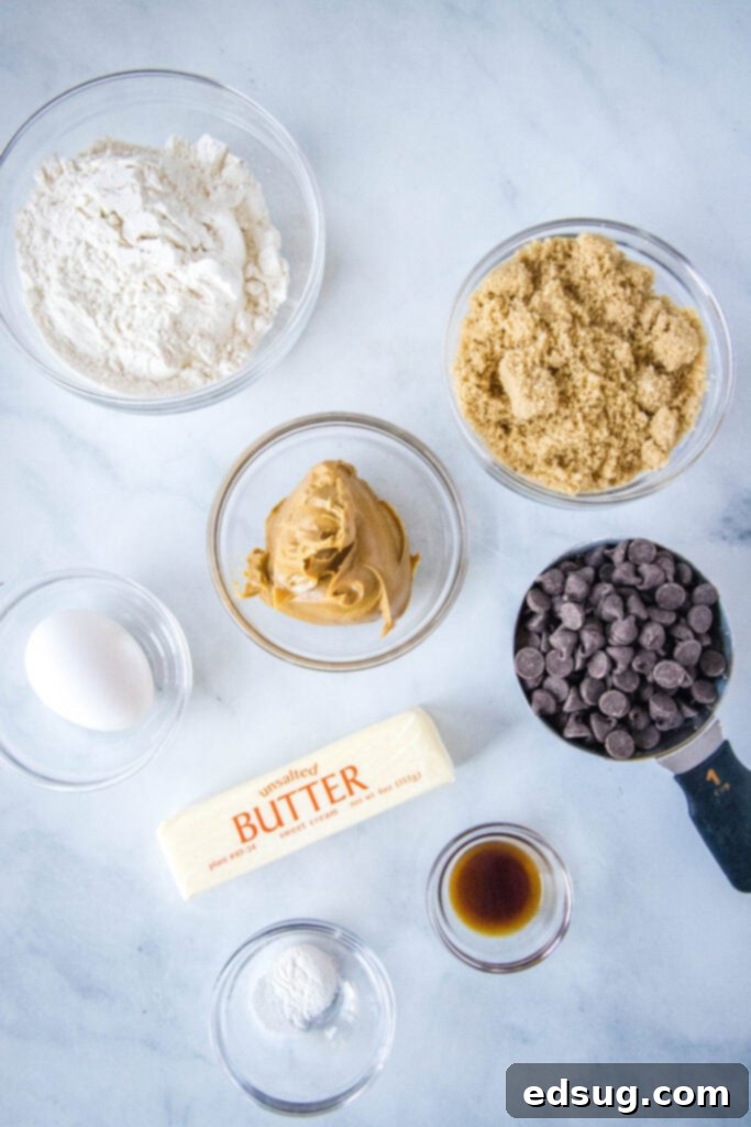 Ultimate Peanut Butter Chocolate Chip Bars 3 Ingredients laid out for making peanut butter chocolate chip blondies on a kitchen counter