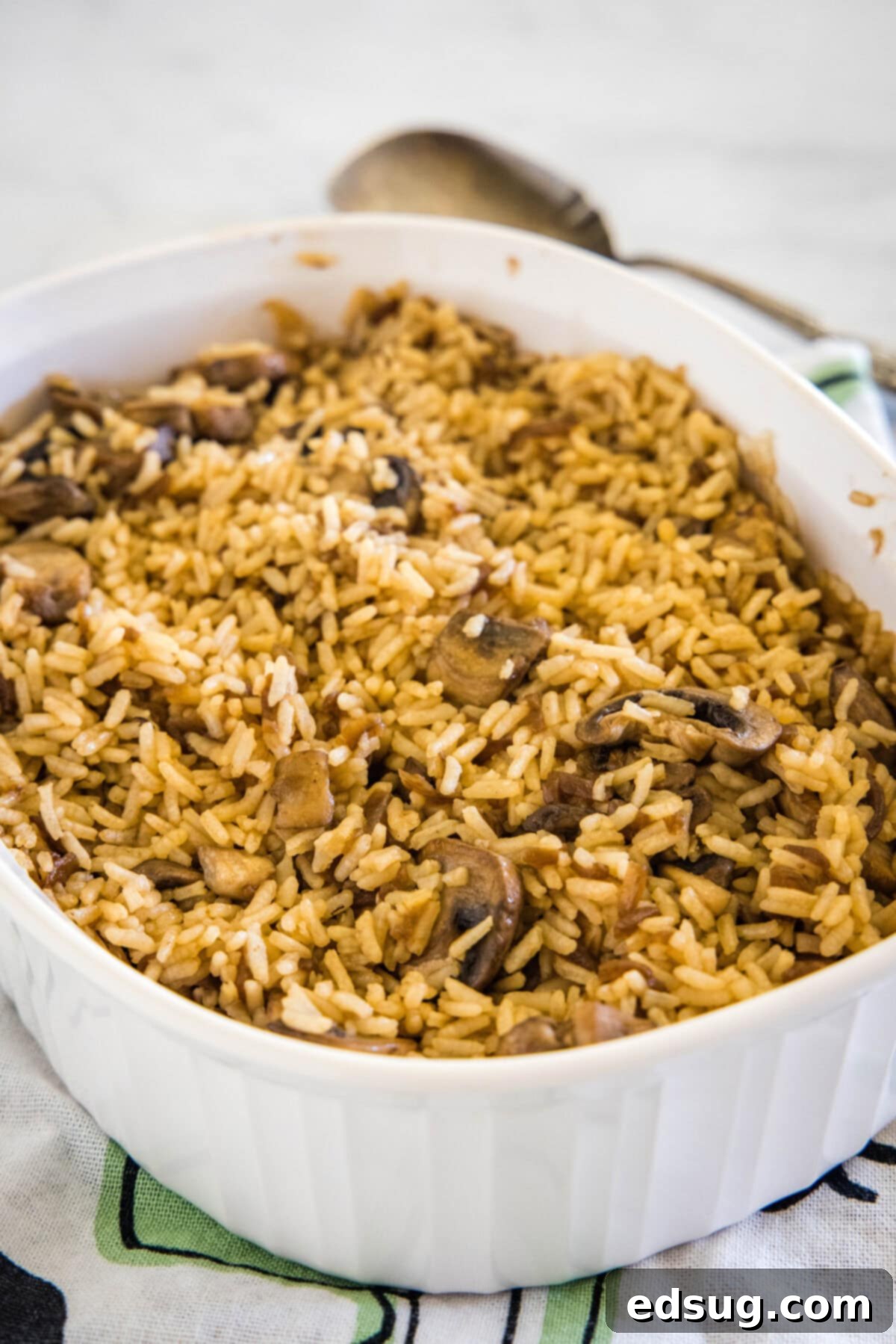 stick of butter rice in a baking dish