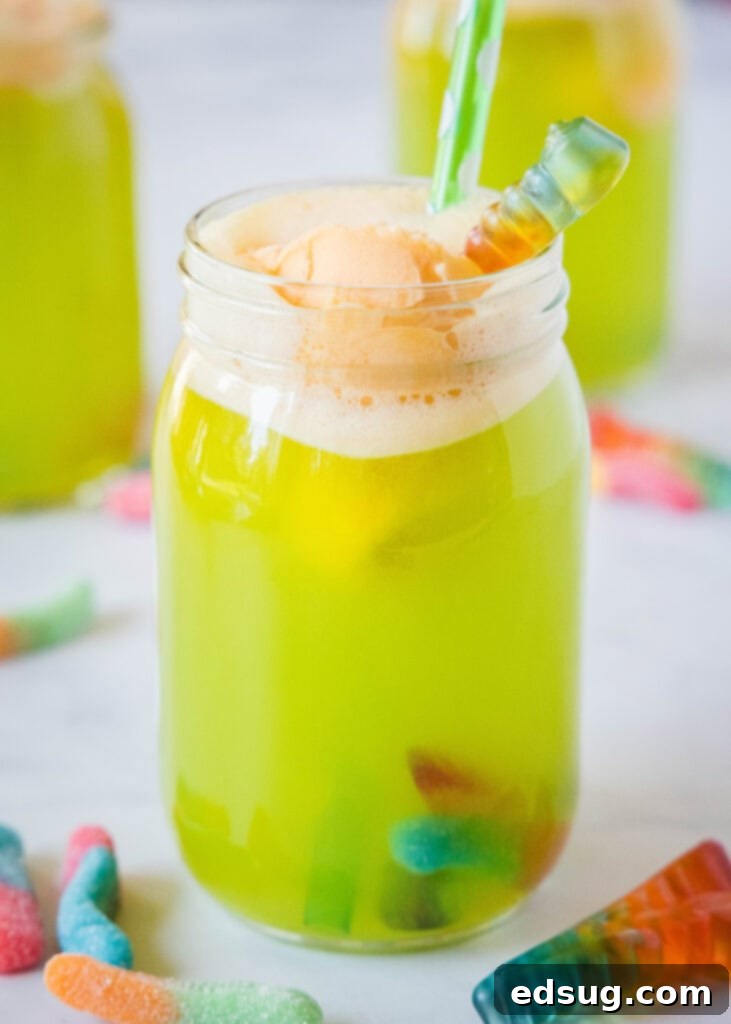 Cauldron's Whisper 2 fun green halloween drink for kids with orange sherbet