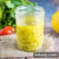 close up of greek vinaigrette in a jar