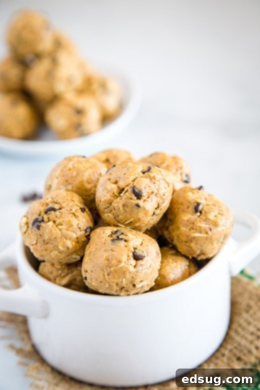 Protein Peanut Butter Energy Bites 3 Peanut Butter protein balls are a perfect quick snack, arranged neatly on a serving plate.