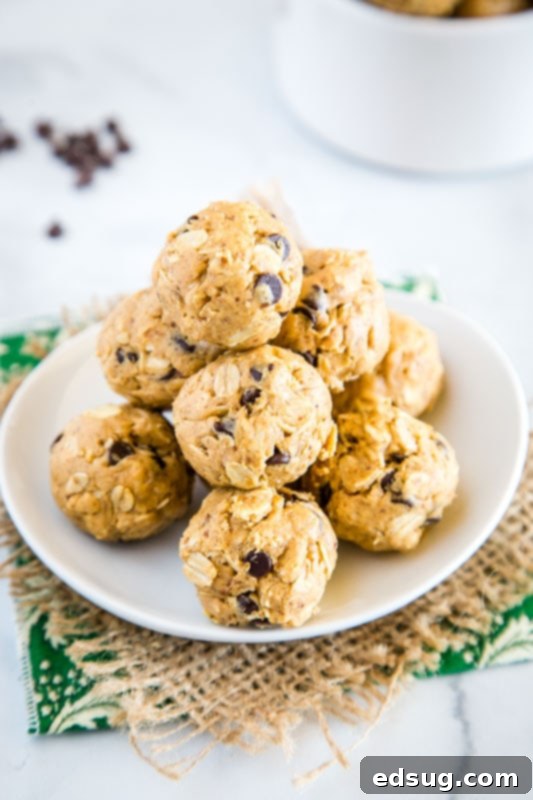 Protein Peanut Butter Energy Bites 4 Homemade energy balls are a great snack to have in the fridge - peanut butter, oats, honey, and even chocolate on a wooden board