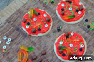 creepy cookie pizzas on a table