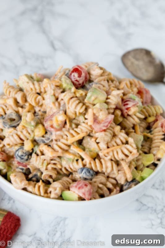 Another perspective of the delicious taco pasta salad, showing its inviting texture and vibrant colors.