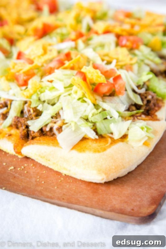 Tex-Mex Pizza 2 Tacos and pizza come together in one easy and tasty Taco Pizza, topped with fresh ingredients like lettuce and tomatoes