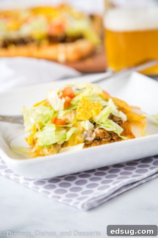 Tex-Mex Pizza 3 Pizza night just got better with this Taco Pizza recipe. Your favorite taco flavors transform into a quick and easy dinner.