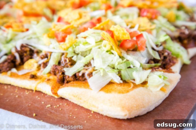 Tex-Mex Pizza 5 Taco Pizza - A super easy pizza recipe with all the flavors of taco night! A fun dinner the entire family will love!