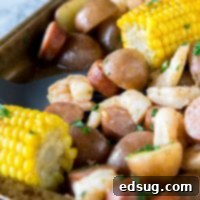 Sheet Pan Shrimp Boil - an easy homemade version of a classic shrimp boil, made in the oven. Shrimp, sausage, potatoes, and corn make for one amazing meal!