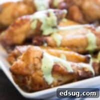 Green Goddess Baked Chicken Wings 7 Baked Chicken Wings with Creamy Green Sauce - get the taste of Peru with these super easy chicken wing. Tons of seasoning and a creamy cilantro lime sauce for dipping!