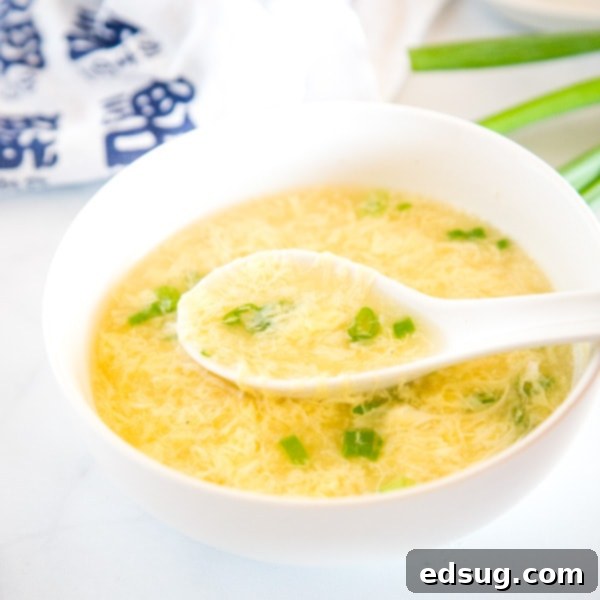 Homemade Asian Outshining the Takeout 23 Egg Drop Soup Recipe - a classic Chinese take out dish you can make at home in just 15 minutes. Seriously comforting, better than the restaurant version and so easy to make.