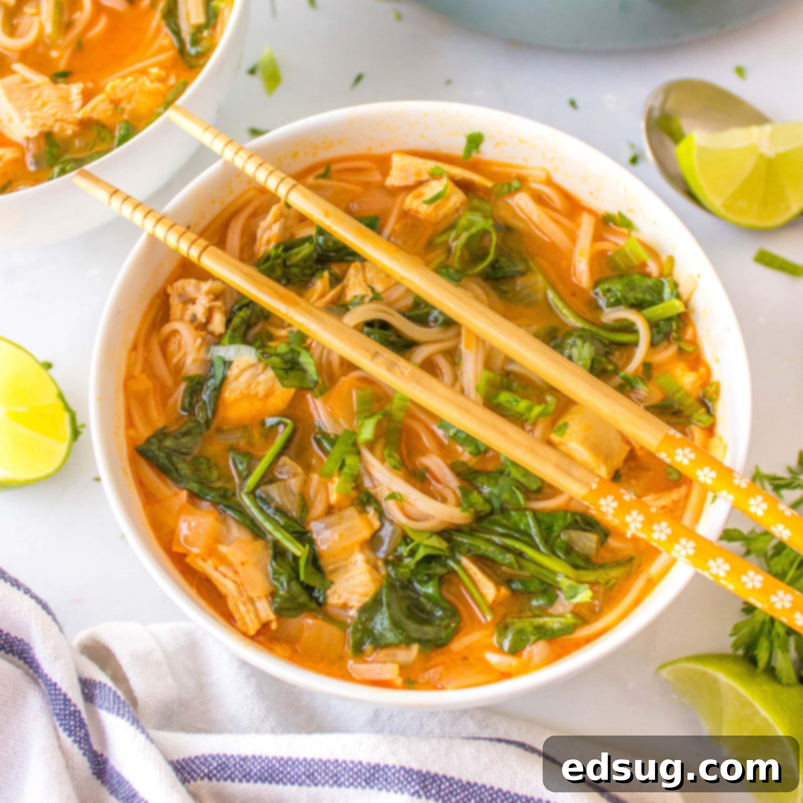 Homemade Asian Outshining the Takeout 26 cropped close up thai red curry soup with chopsticks on the bowl