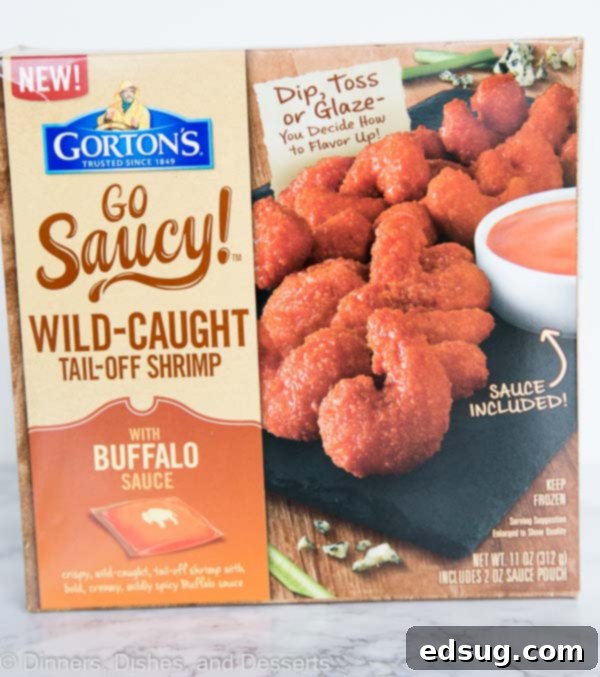 A close-up shot of a Gorton's Go Saucy! Buffalo Shrimp product box, prominently displaying the brand logo and the delicious promise of ready-to-cook seasoned shrimp.