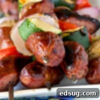 Sizzling Sausage and Veggie Kebabs 8 Grilled Sausage and Vegetable Kebobs - fire up the grill, use Polish Sausage and your favorite veggies, to make these easy kebobs for dinner or for your get togethers this summer!