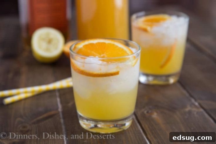 Whiskey Sour Punch with oranges and ice