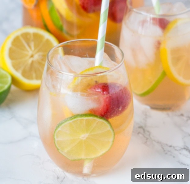 White Sangria served in a glass with fruit