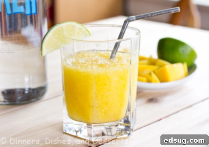 Mango Citrus Cooler with lime and mango slices