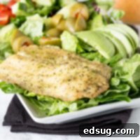 Mediterranean Garlic Herb Salad 7 Garlic & Herb Mediterranean Salad - A crisp salad with fresh salad with garlic & herb tilapia and topped with a lemon garlic vinaigrette.