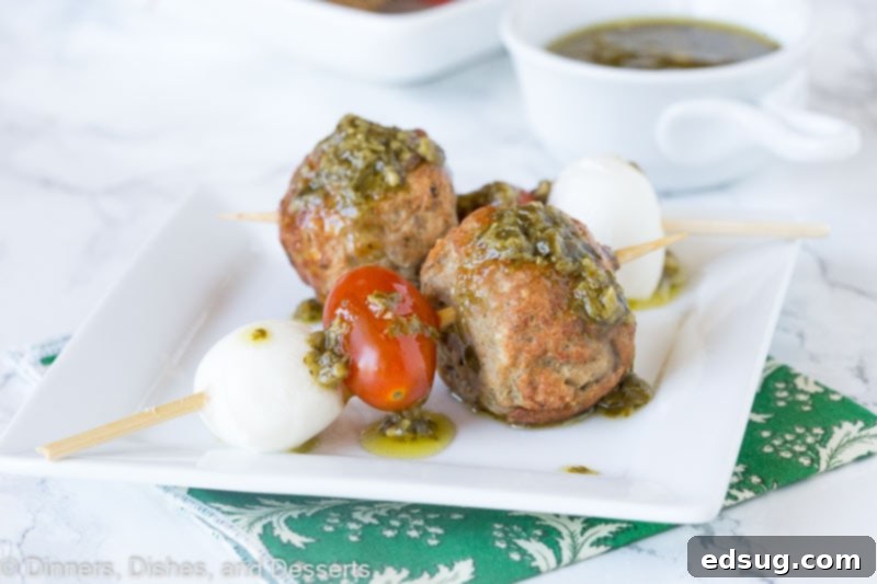 Meatball Caprese Bites 5 A tray of assembled Italian Meatball Caprese Skewers with pesto vinaigrette