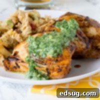 Chargrilled Chicken Thighs 6 Grilled Chicken Thighs with Chile Herb Sauce - chicken thighs marinated in a blend of garlic, spices and lime juice. Grilled and then topped with a creamy herb and jalapeno sauce.