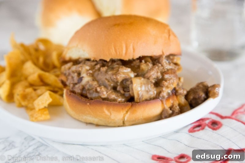 Loaded Philly Cheesesteak Sloppy Joe 4 A plated Philly Cheesesteak Sloppy Joe with side dishes